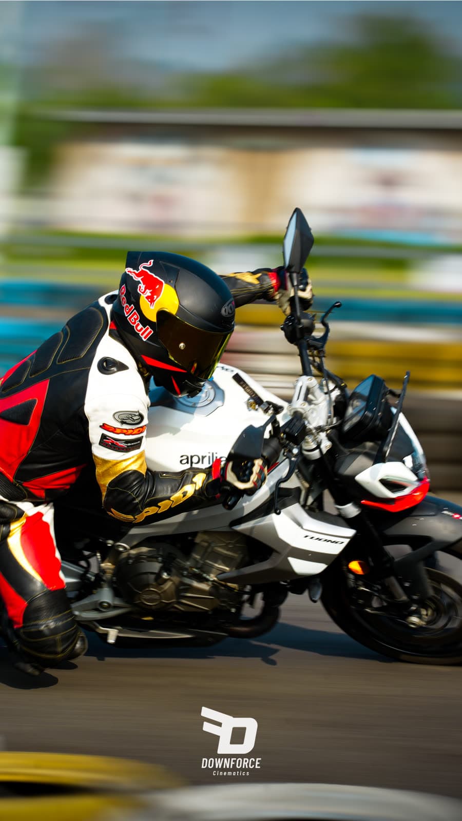Rider on a supersport bike, vertical panning shot